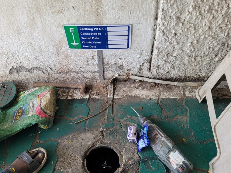 Earthing pit inspection cover with test tag