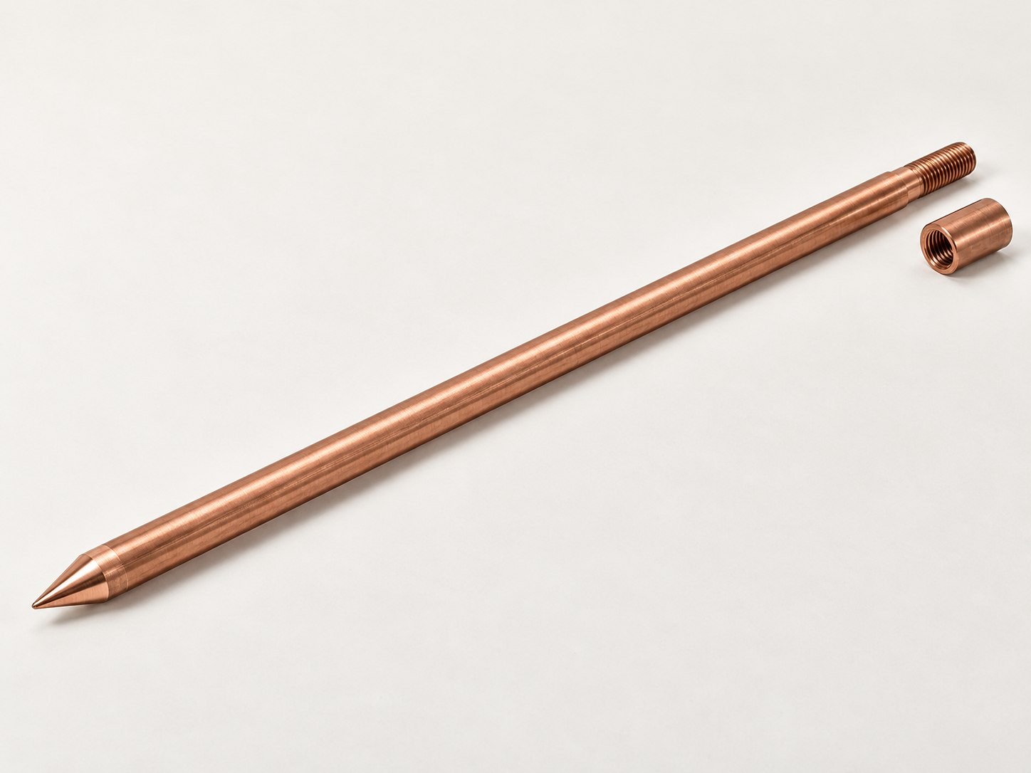 Illustrative copper-bonded rod assembly with coupling and driving tip